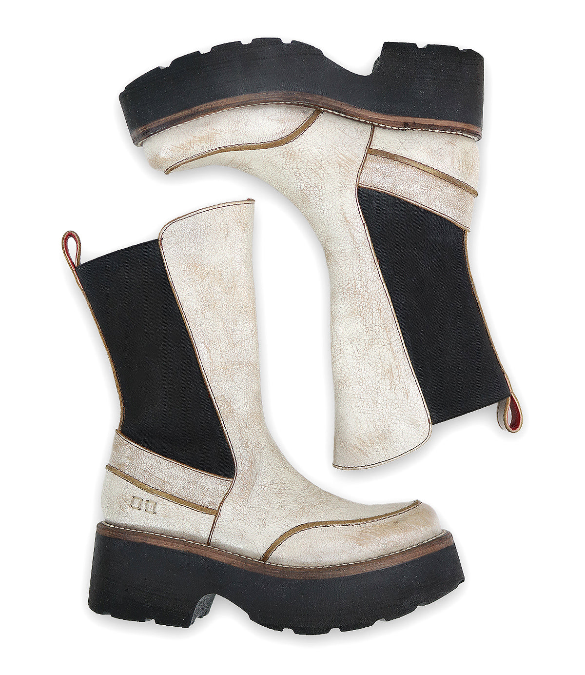 The "Illicit" boots from Bed Stu, featuring a beige and black design with chunky soles and red pull tabs, exude retro flair against a white background.