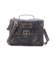 The Bed Stu Improv is a worn brown leather satchel with a front flap, metal buckle closure, top handle, and adjustable crossbody strap, blending style and function against a plain white background.