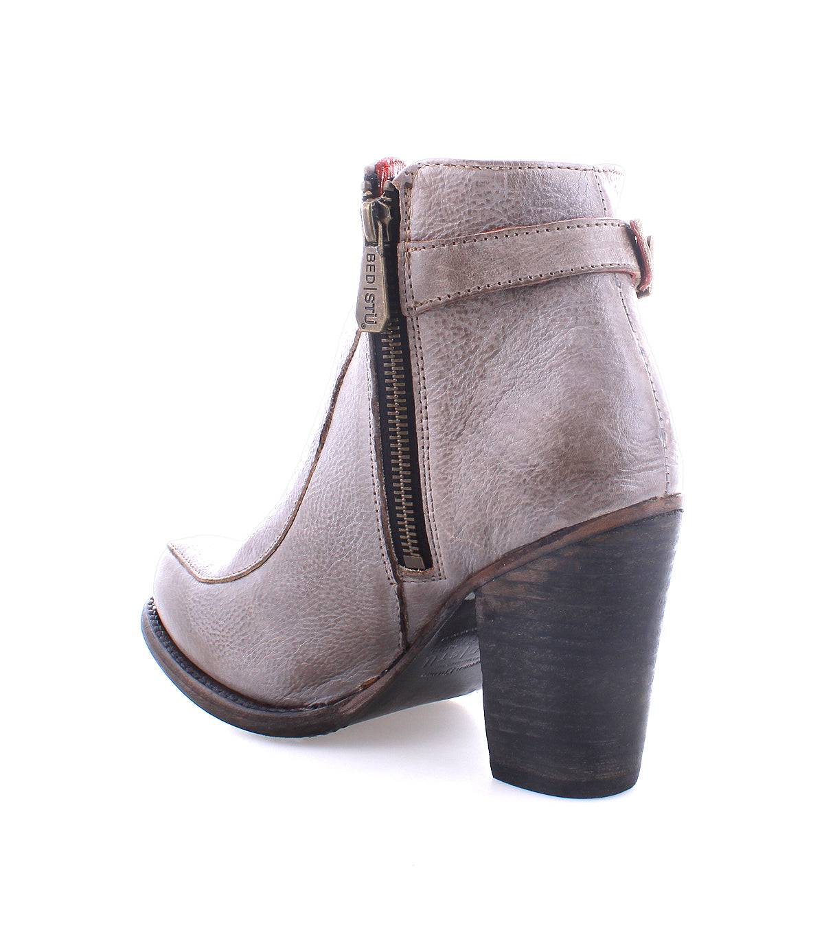 Women's leather Isla heeled bootie with side zipper by Bed Stu on a white background.