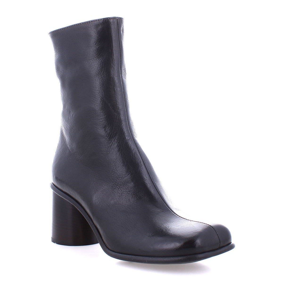 The Isodora by Bed Stu is a black leather ankle boot, handcrafted from Italian leather, showcasing a high block heel and rounded toe with a smooth finish, displayed on a white background.