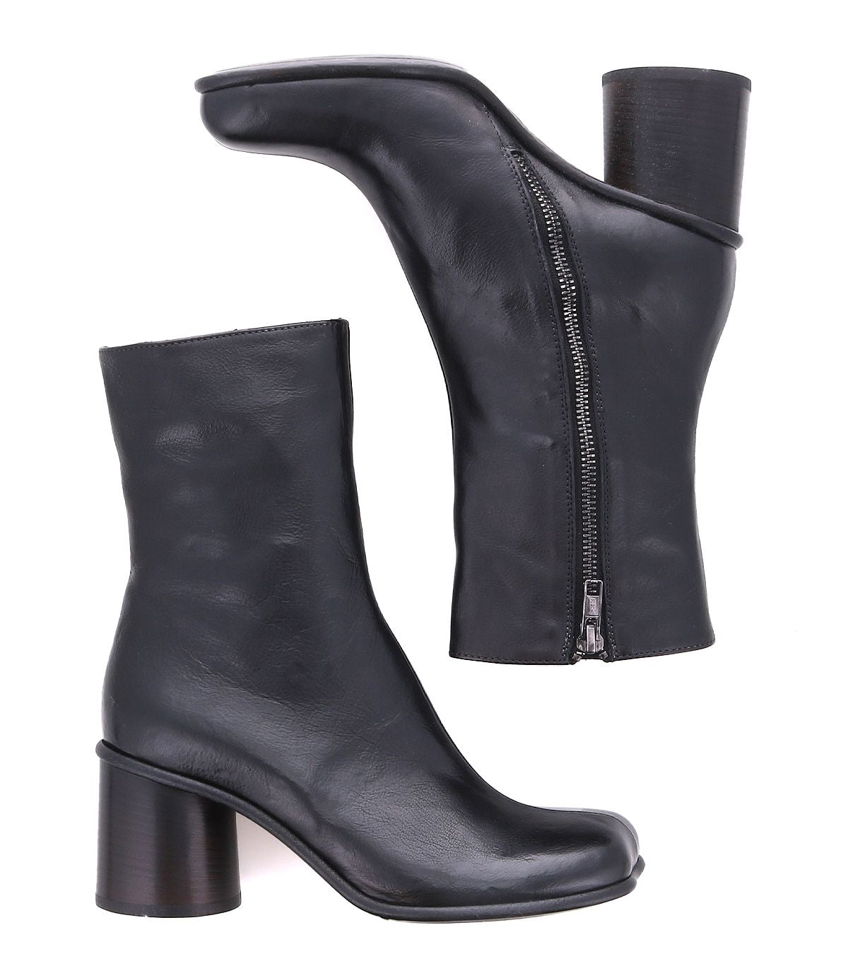 The Isodora by Bed Stu showcases Italian leather ankle boots with side zippers and chunky heels, highlighted by an elegant asymmetrical square toe design, pictured from two angles against a white background.