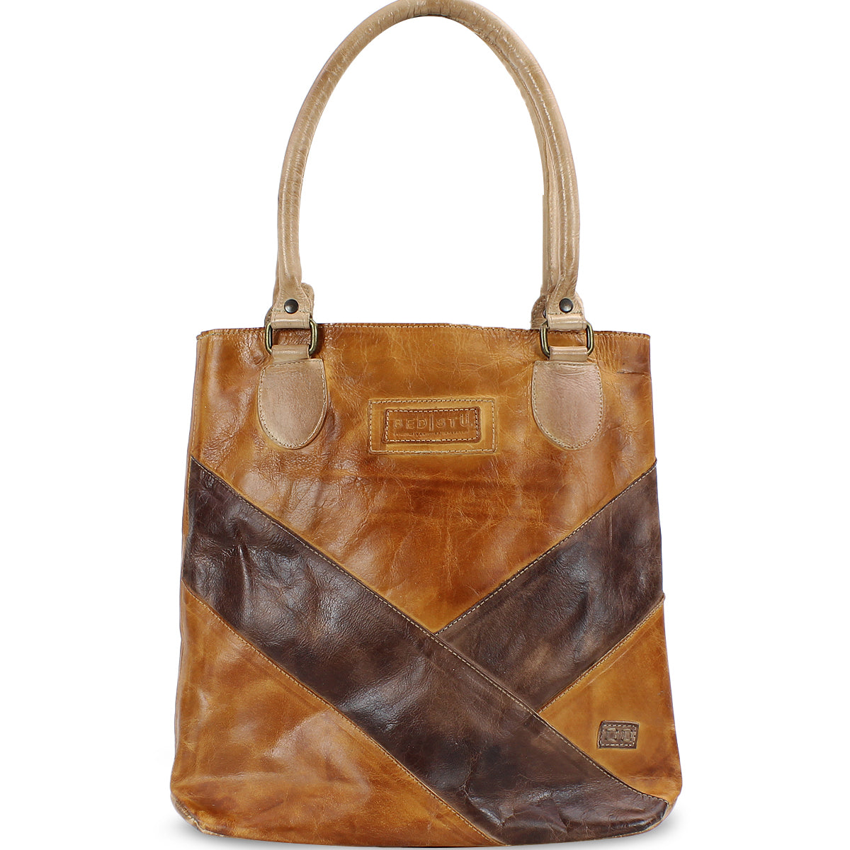 The Italic handbag by Bed Stu features a classic brown leather design with a darker brown diagonal stripe, two beige handles, and a small rectangular logo patch on the front. This spacious tote bag comfortably holds all your essentials.