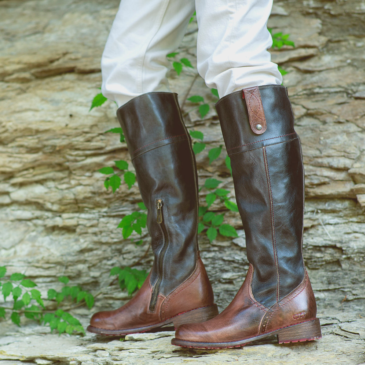 A woman confidently strutted in her Jacqueline Wide Calf, leather riding boots from Bed Stu, ready to embrace the Fall and Winter seasons.
