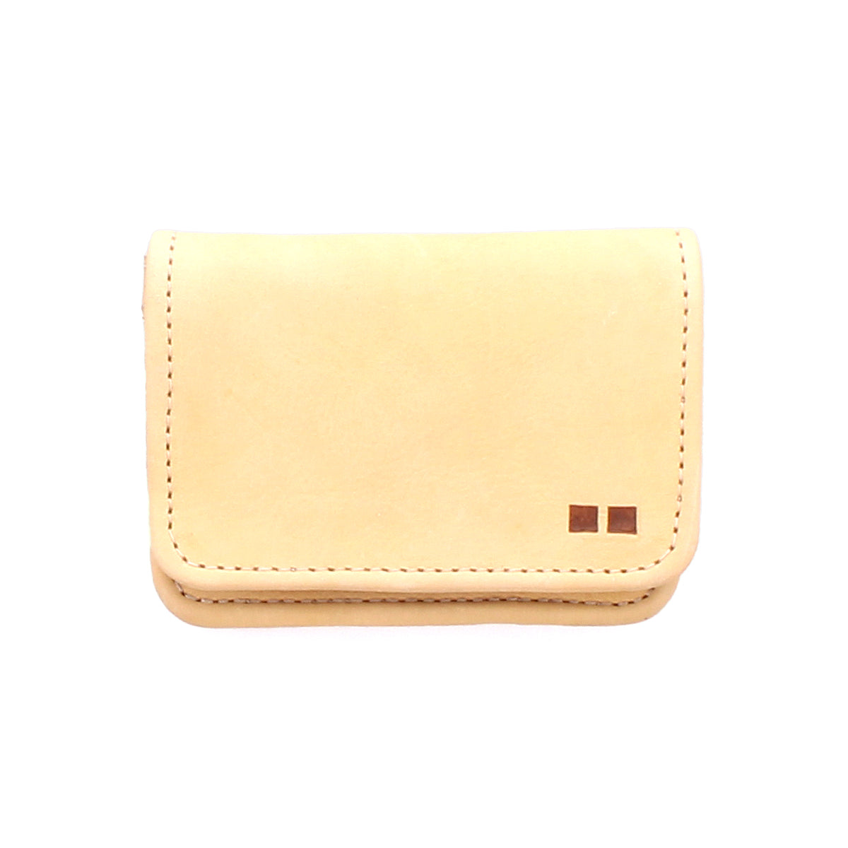 The Jeor card holder by Bed Stu is a small, rectangular beige rustic leather accessory featuring visible stitching and two square accents in the bottom right corner.