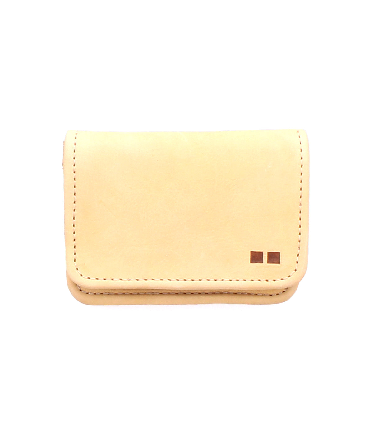 The Jeor card holder by Bed Stu is a small, rectangular beige rustic leather accessory featuring visible stitching and two square accents in the bottom right corner.