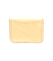 A plain, beige rustic leather card holder—Bed Stu's Jeor—features visible stitching and is photographed against a white background.