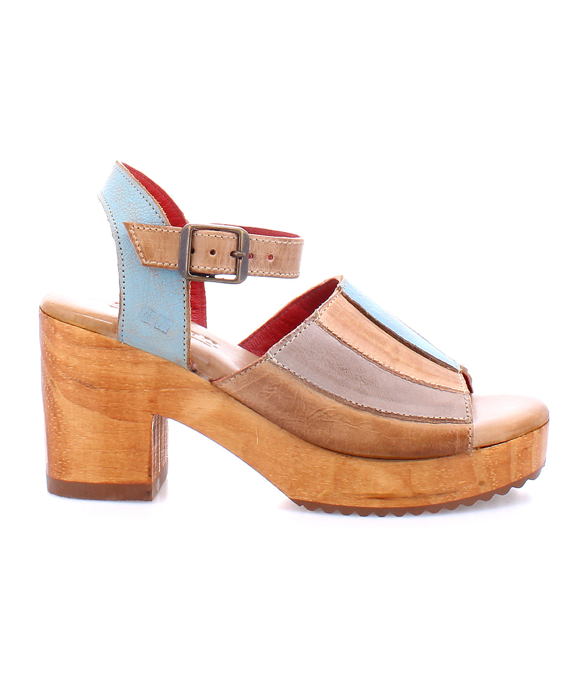 A pair of Bed Stu Jetsetter women&#39;s sandals with a wooden heel and leather finish.