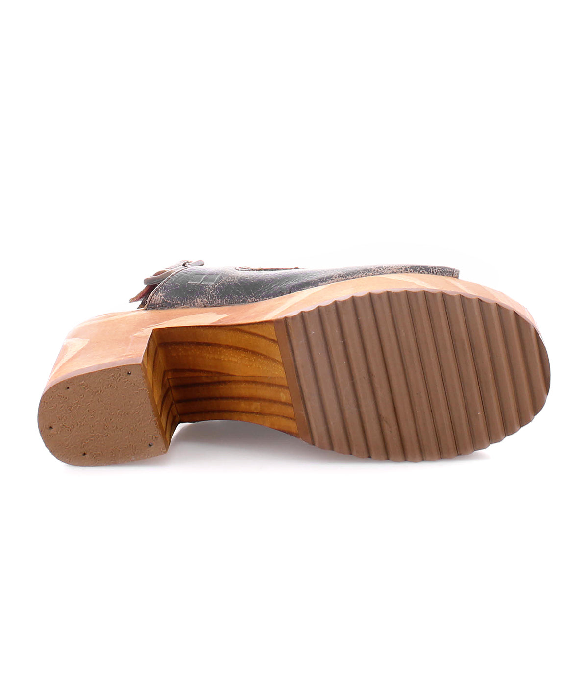 The back of a Jinkie shoe with a wooden sole and an adjustable ankle buckle. Brand Name: Bed Stu.
