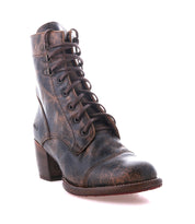 A single brown Bed Stu Judgement boot in distressed leather, featuring an 8-eye lace-up design and a low stacked heel, is shown on a white background.