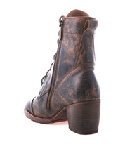 The Bed Stu Judgement boot, shown from a rear side view on a white background, features brown distressed leather, an 8-eye lace-up front, side zipper, and block heel.