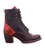 The Bed Stu Judgement boot is a brown leather ankle boot with an 8-eye lace-up design, featuring a 2-inch wooden block heel and eye-catching red accents.