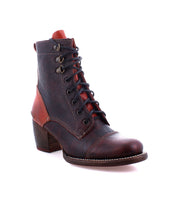 The Judgement boot by Bed Stu is expertly crafted from brown and red leather, showcasing an 8-eye lace-up design with metal eyelets and a chic block heel.