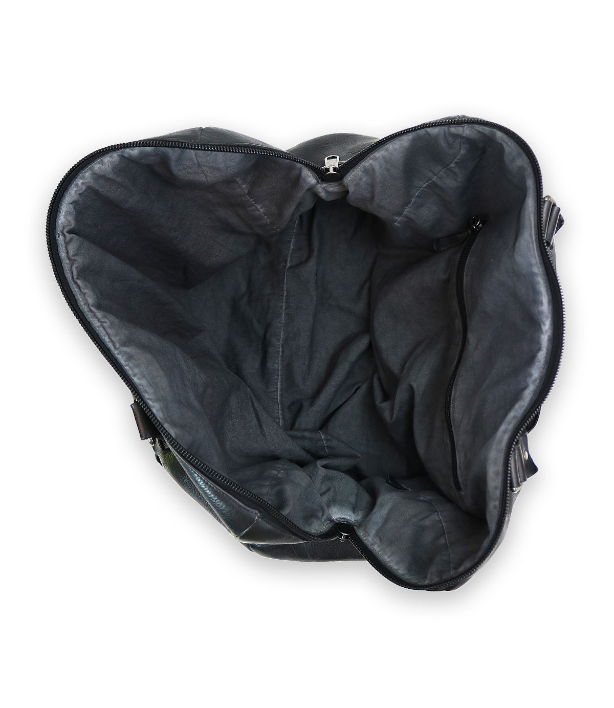 Top view of an open, empty leather travel duffle bag, crafted from vegetable tanned leather, featuring a zippered pocket on the inner side. The Keg by Bed Stu.