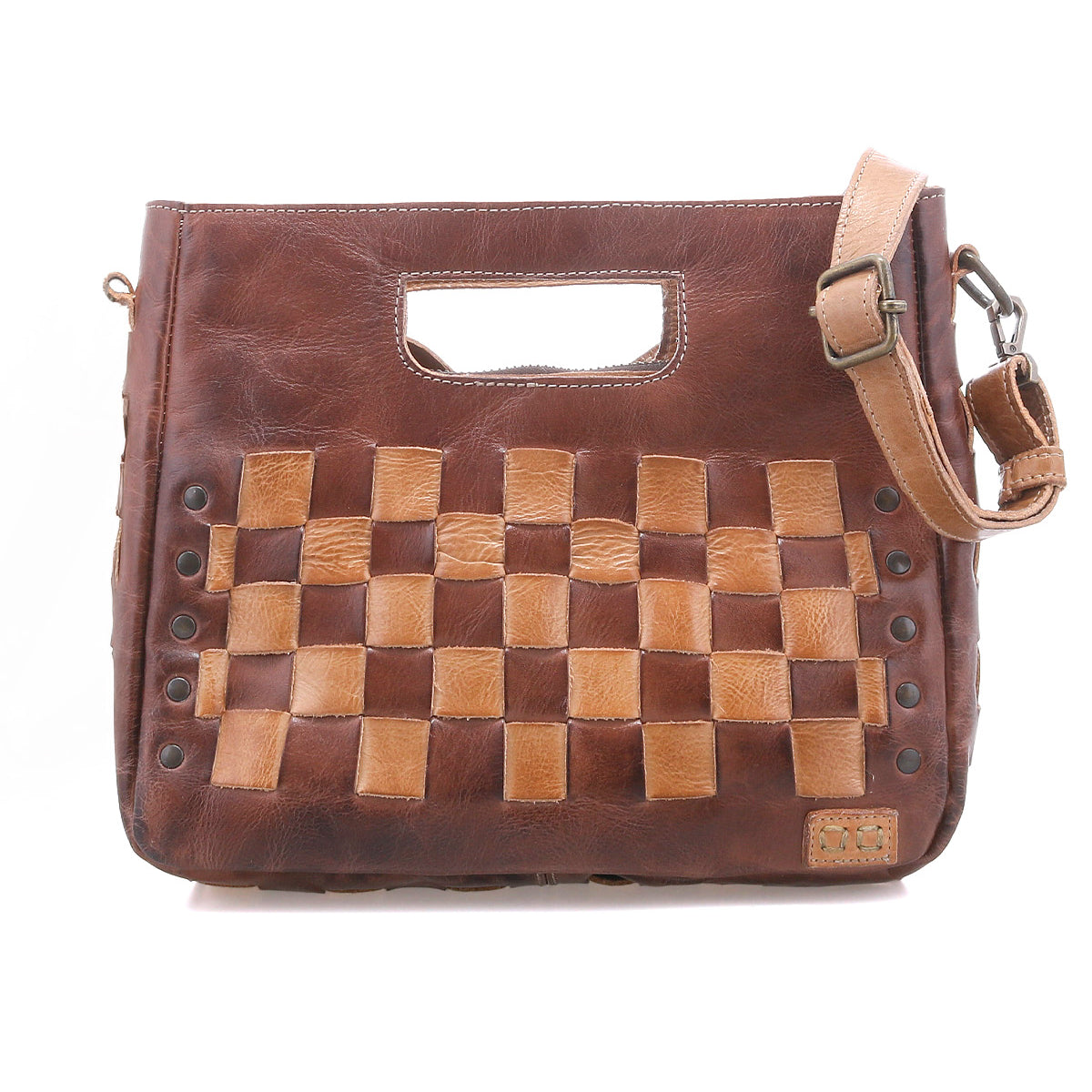 The Keiki by Bed Stu is a compact brown leather crossbody featuring a tan-and-brown woven checkerboard front, rectangular cutout handle, and adjustable shoulder strap—perfect for stylish outings.