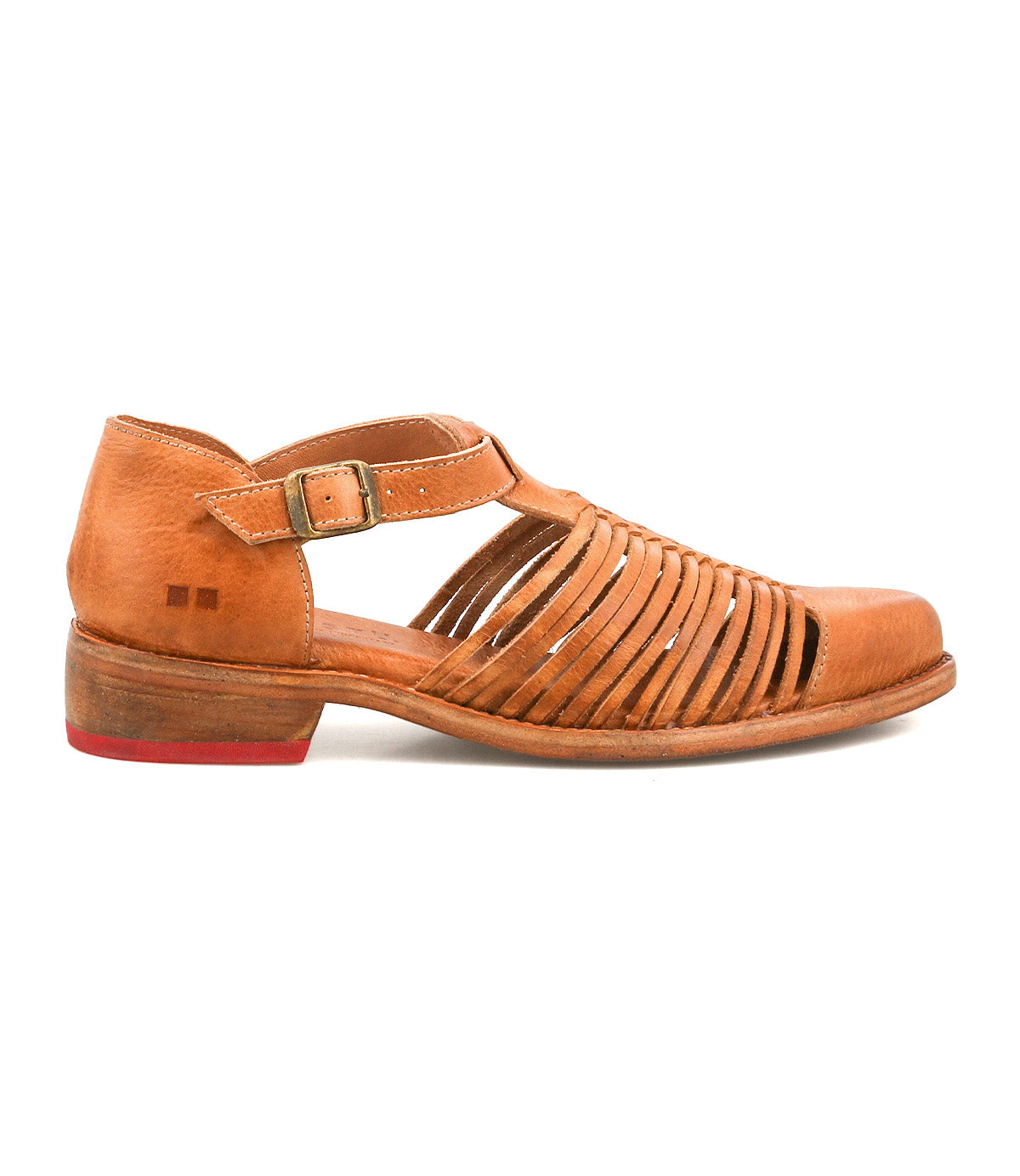 The Bed Stu Kenna is a brown leather closed-toe sandal featuring multiple thin straps, woven cutouts, an adjustable buckle ankle strap, a low wooden heel, and a small red patch on the sole.