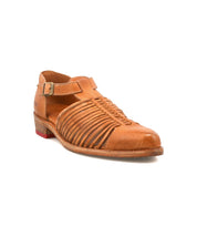 The Bed Stu Kenna is a brown leather sandal with a closed toe, woven cutouts, an adjustable ankle strap, low heel, and a small red accent on the back.