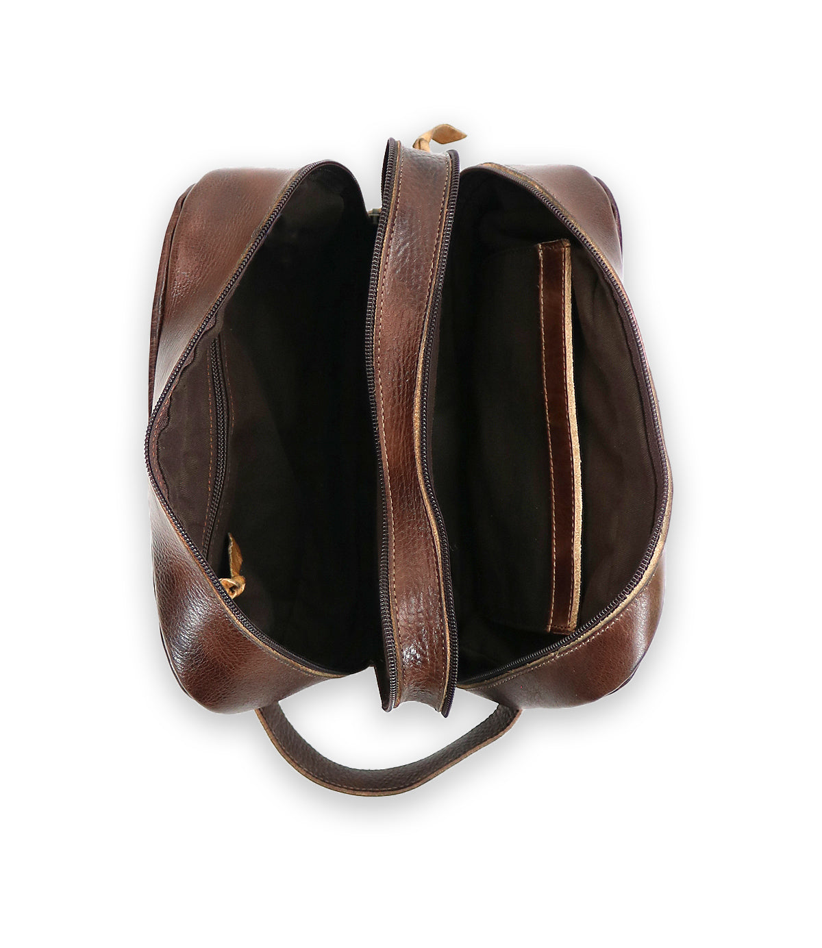 Top view of a brown leather dopp kit with its main compartment and inner pocket open, revealing a dark interior. The Kip by Bed Stu, crafted from vegetable-tanned leather, has a single handle, making it perfect for carrying travel essentials.