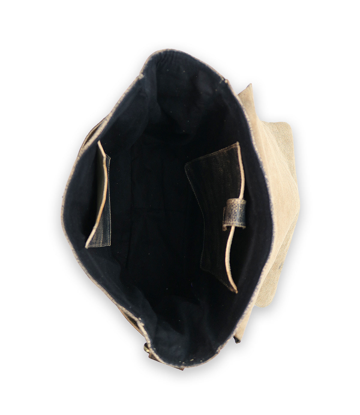 A photo of the inside of an open, empty canvas or fabric bag, showing a black lining and inner pockets crafted from vegetable tanned leather. The bag is the Kure by Bed Stu.