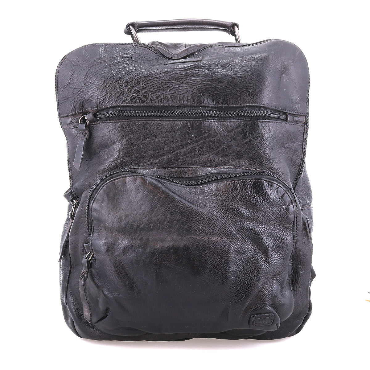 The Bed Stu Lafe backpack, crafted in black leather with a top handle, features two zippered front pockets and a discreet security tab. Set against a plain white background, it combines style and functionality with its spacious design.
