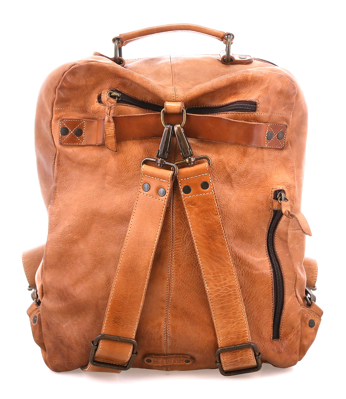 The Bed Stu Lafe is a tan leather backpack with black zippers, adjustable shoulder straps, a top handle, and multiple pockets—a spacious carry-on solution—shown against a white background.