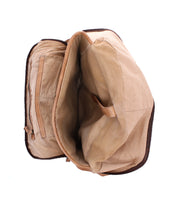 The Bed Stu Lafe is an open tan canvas work bag with visible inner compartments and a leather strap, shown from a top-down view—perfect as your carry-on companion.