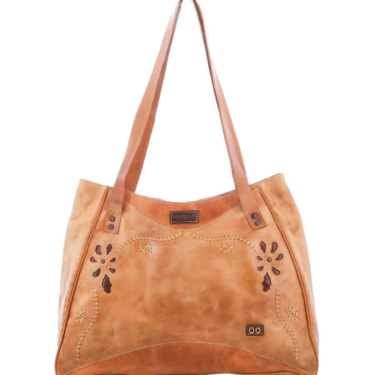 Larue LTC by Bed|Stü: light brown bag with floral cut-out designs, double handles, and a small metal logo plate in the lower right corner.