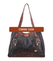 Bed|Stü Larue LTC dark brown leather shoulder bag with floral motif cutouts and handstitched details, featuring a “COMING SOON” banner across the center.