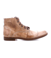 The image displays the Leonardo by Bed Stu, a light brown leather boot with a worn texture in a side view, featuring a comfortable insole for all-day wear.