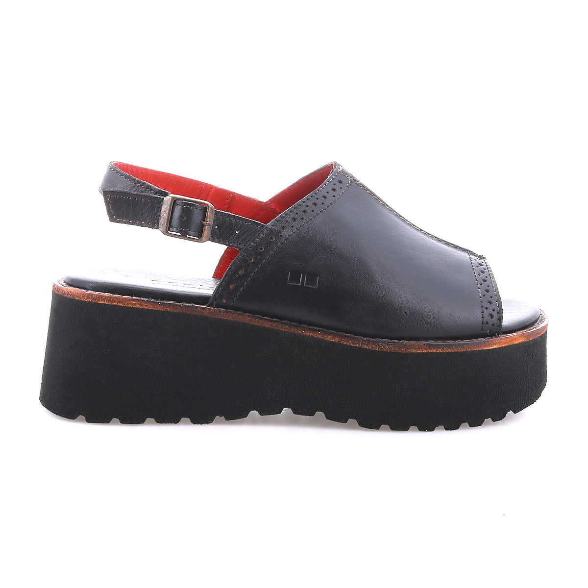 The Bed Stu Library is a black open-toe platform sandal with an adjustable ankle strap, thick black sole, and brown trim detail for a '90s retro vibe, shown against a white background.