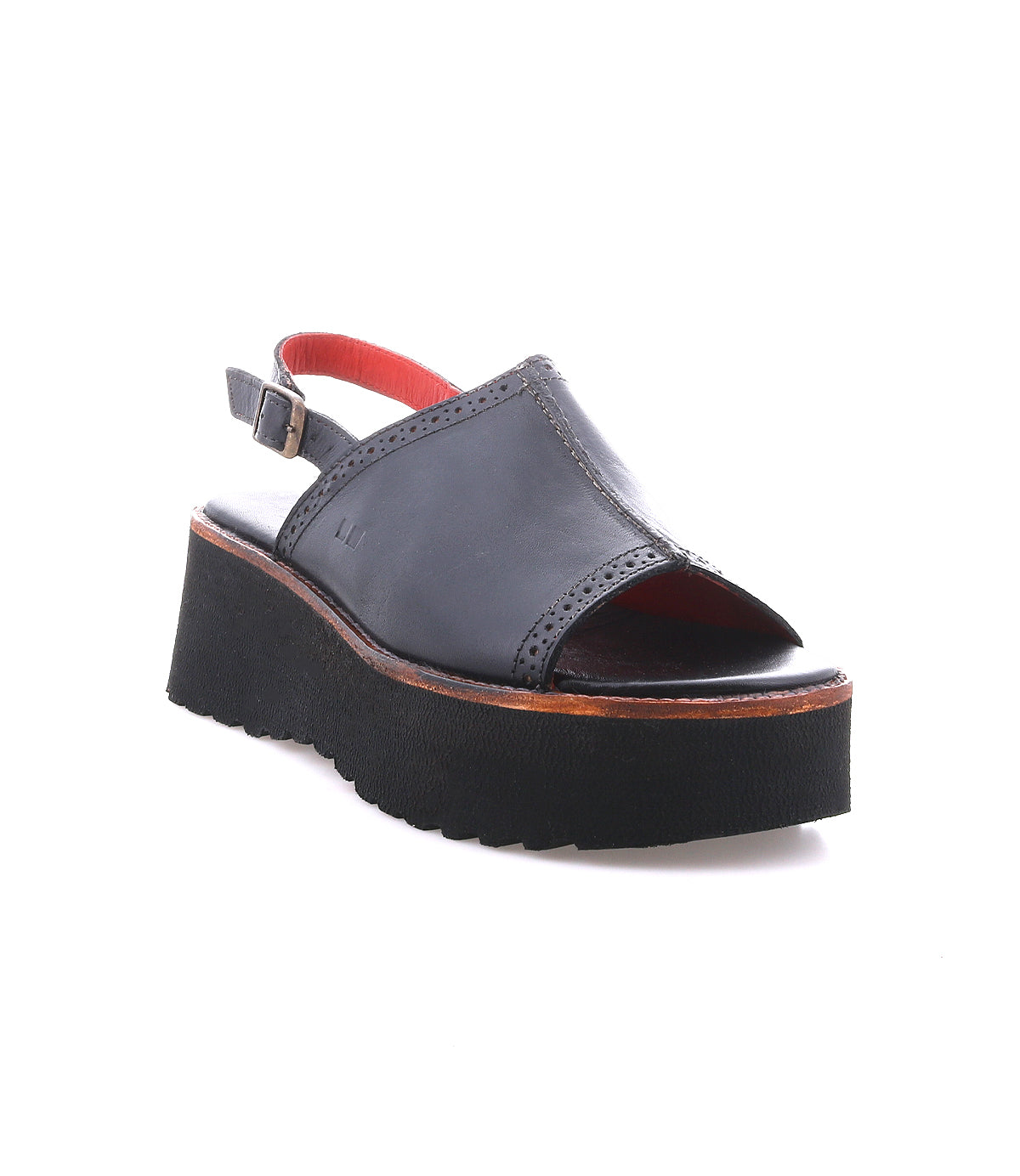 Bed Stu Library black open-toe platform sandal features a thick sole, adjustable ankle strap, and red interior lining for a '90s-inspired look. Displayed on a white background.