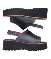 A pair of Bed Stu Library black leather 1990s platform sandals with chunky soles and ankle straps, displayed side-by-side on a white background.