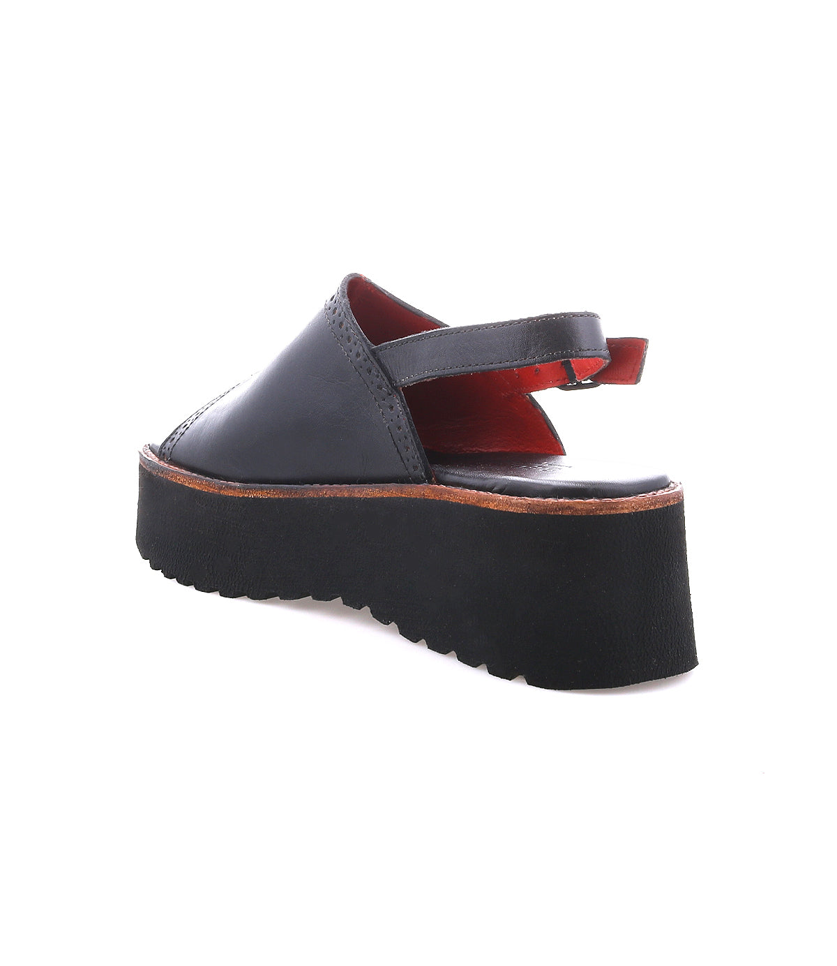 The Bed Stu Library is a black open-back platform sandal with a thick, ridged sole and adjustable heel strap, offering '90s nostalgia and retro style, shown on a white background.