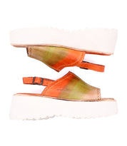 The Bed Stu Library sandals feature thick white platform soles and orange-green gradient leather uppers, shown in side view on a white background—ideal for infusing your retro style with a dash of '90s nostalgia.