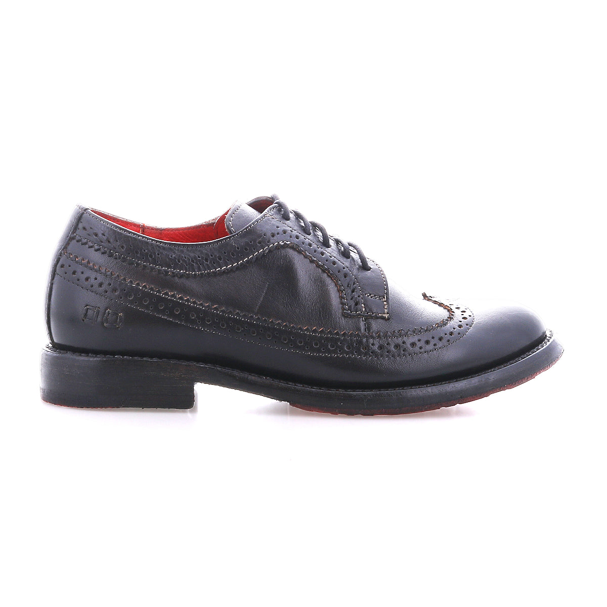 The Bed Stu Lita K II black leather wingtip shoes feature decorative perforations, a lace-up closure, and a low heel, shown from the side on a white background.