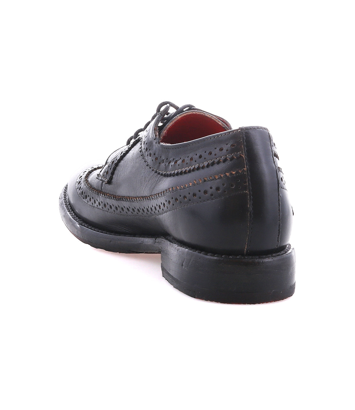 The Bed Stu Lita K II, a black leather wingtip derby shoe, is displayed from the back left angle on a white background.