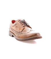 The Bed Stu Lita K II is a brown leather wingtip oxford shoe with brogue details and dark laces, shown against a white background.