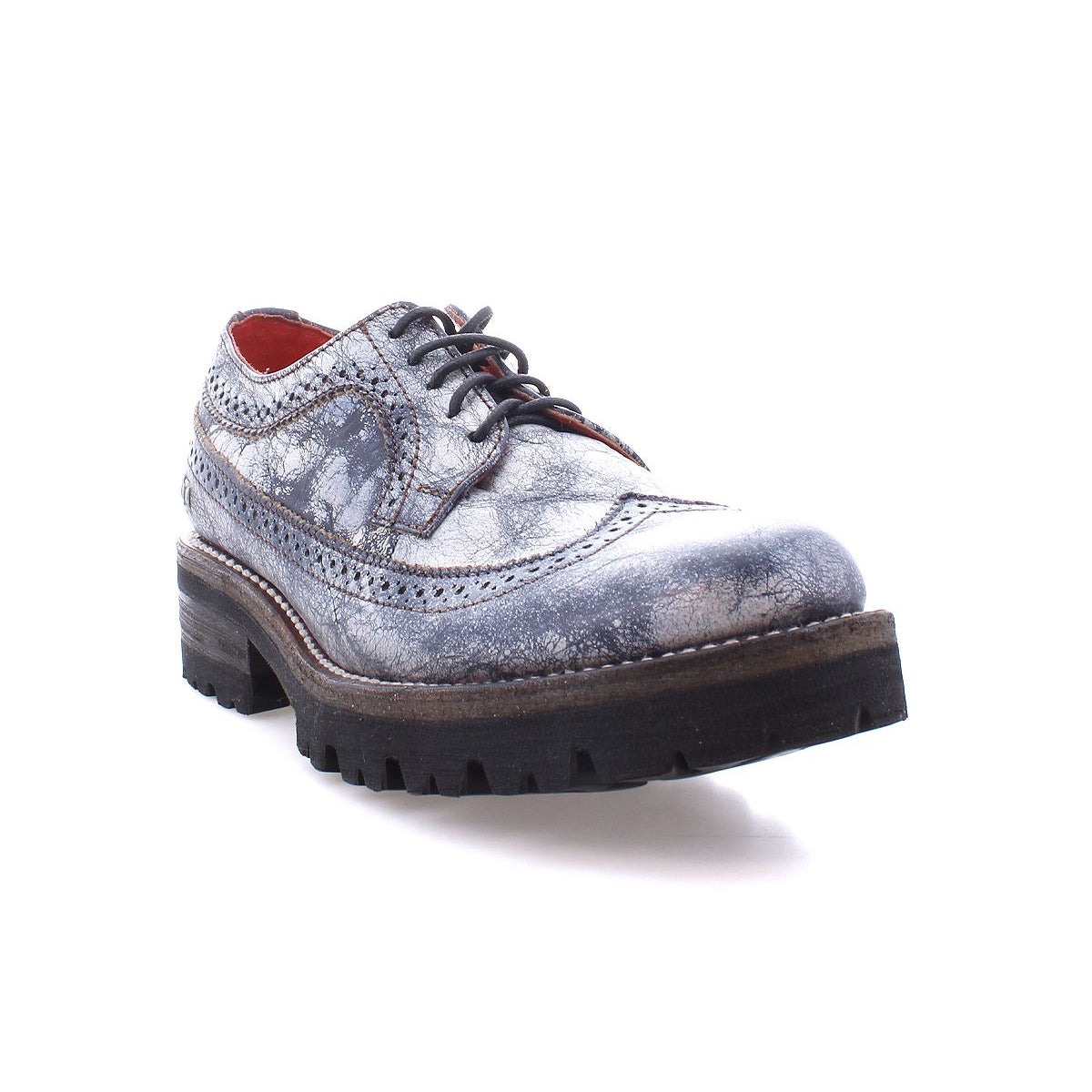 The Lita K III by Bed Stu, a gray leather Oxford shoe featuring a textured finish and thick black sole, is depicted from a low angle on a white background, embodying retro chic with a nod to 90’s fashion.
