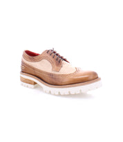 A men's wingtip lace up shoe in tan, the Lita K III by Bed Stu, a sustainable option for your fall wardrobe.