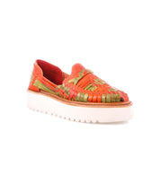 The Lizzie by Bed Stu features a hand-woven leather huarache in an orange and green pattern, atop an XL EXTRALIGHT® outsole for maximum comfort and style.