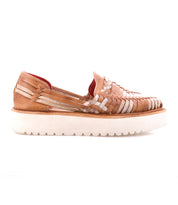 The Bed Stu Lizzie is a brown hand-woven leather platform huarache slip-on with a thick white durable outsole, shown in side profile on a white background.