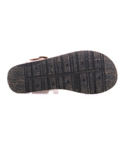 The image shows the textured black rubber sole of the Bed Stu Lone strappy sandal, photographed from the bottom against a white background.