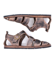 The Bed Stu Lone sandals are brown gladiator-style flats with distressed leather, multiple straps, an antique brass buckle, and flat soles, displayed from side and top views.