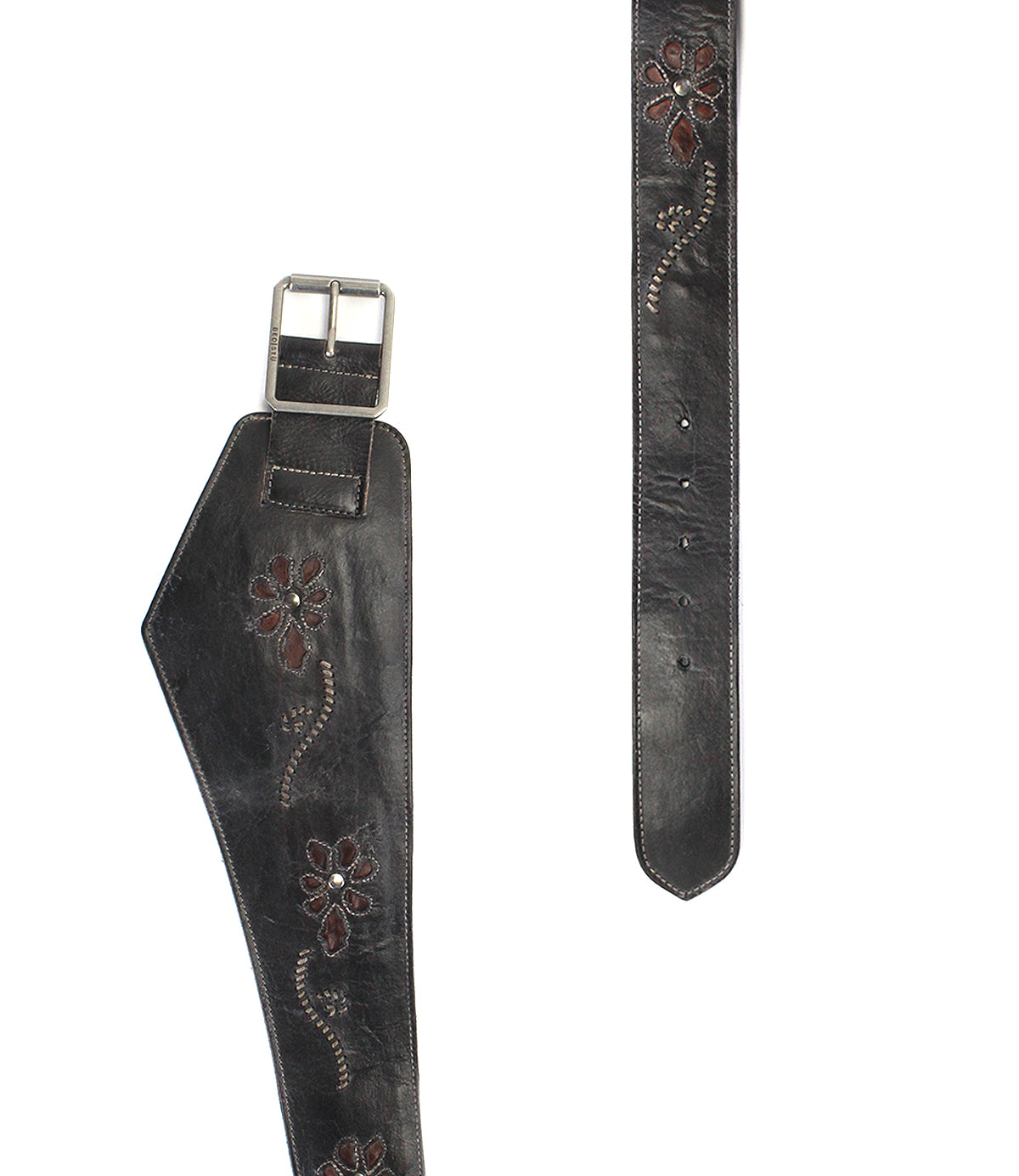 The Lucen wide black leather belt by Bed|Stü, featuring silver buckle and floral embroidery, is shown laid flat with both ends visible on a white background—an eye-catching accessory that brings boho-chic flair to any outfit.