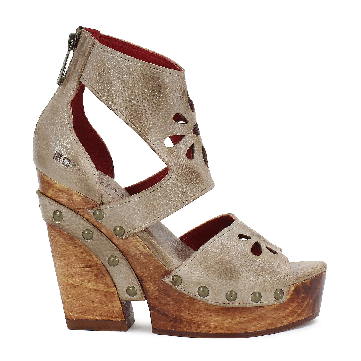 A women's sandal with wooden platform and cut outs from Bed Stu's Lucrative.