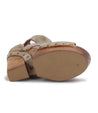 The back view of a Bed Stu Lucrative women's shoe with tan leather straps and wooden wedges.