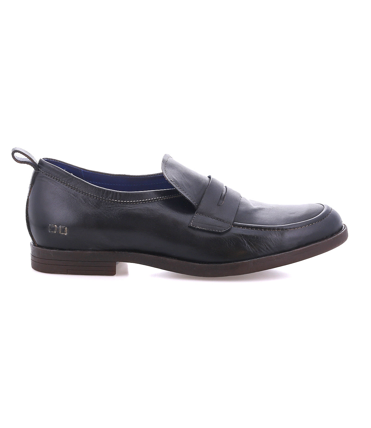 Introducing the Bed|Stü Lumaro: a black distressed leather penny loafer featuring a low heel, decorative upper strap, and back pull tab, displayed in side profile against a white background.