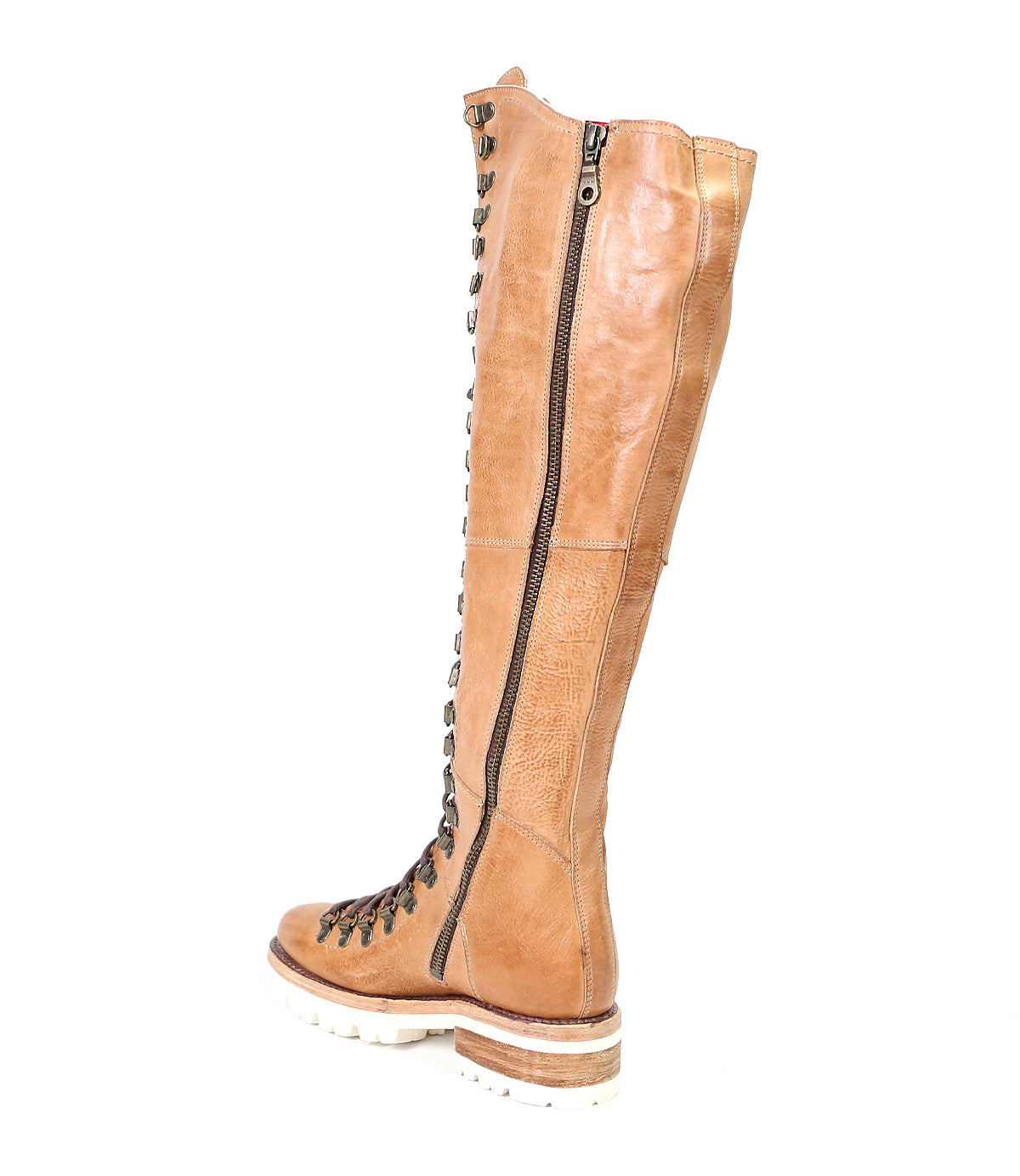 A tall, light brown leather-lined boot with laces and a zipper on a white background by Bed Stu's Lustrous.