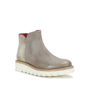 A versatile Lydyi leather ankle boot with a red sole by Bed Stu.