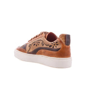 Bed|Stü Lynox tan hand-stitched leather lace-up sneaker with dark brown contrast panels and a floral motif laser-cut into a white rubber sole.