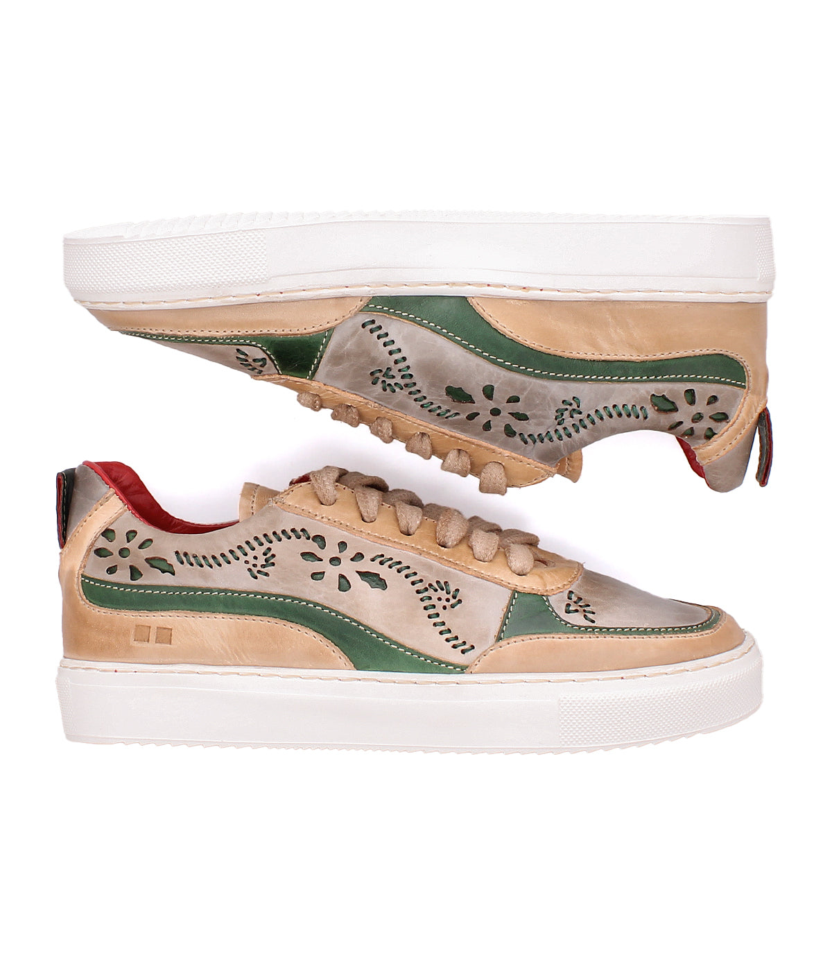 Two beige and green Bed|Stü Lynox sneakers with hand-stitched floral cutouts and white rubber soles, arranged heel-to-toe.